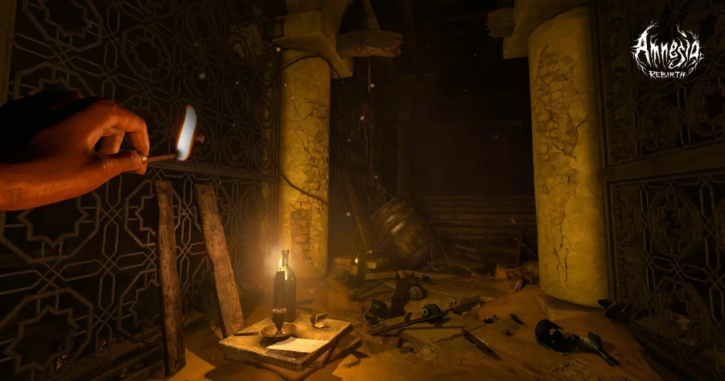 A video game screenshot from Amnesia: Rebirth. The player's hand is holding a lit match, illuminating a dark, ancient room with intricate carvings on the walls. The room is filled with debris, broken bottles, and a candle flickering on a small table.