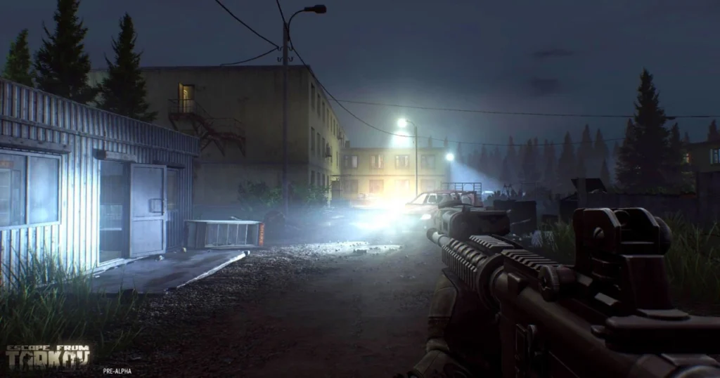 A video game screenshot of Escape from Tarkov. A player character, holding an assault rifle, is crouched in a dimly lit alleyway. The player is looking towards a brightly lit street, where other players can be seen moving.