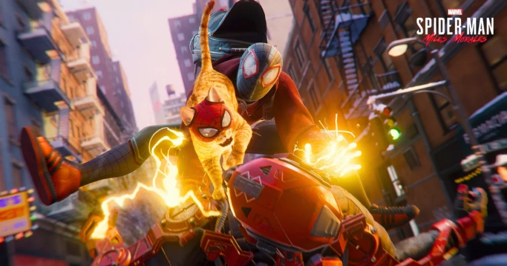 A video game screenshot of Marvel's Spider-Man: Miles Morales. Miles Morales, dressed in his Spider-Man suit, is swinging through the city streets of New York City. His cat, Spider-Cat, is riding on his back, and both are emitting electric sparks. In the background, a futuristic mech suit can be seen.